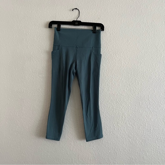 Athleta Salutation Stash Pocket II Capri Leggings In Blue Green Size XS - Picture 3 of 7